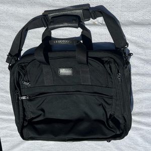Tumi brand bag